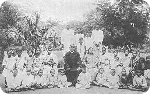 Personnel of the Midnapore Orphanage: The Wolf-Child Kamala at the feet of Rev. and Mrs. Singh